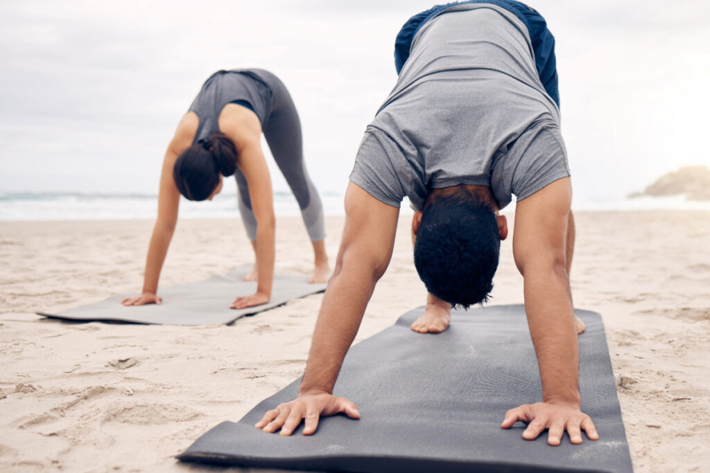 Man and Woman building strength using stabilizer muscles