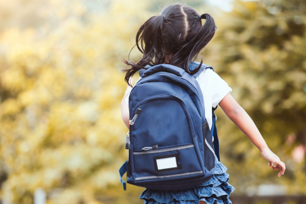 Child wearing backpack