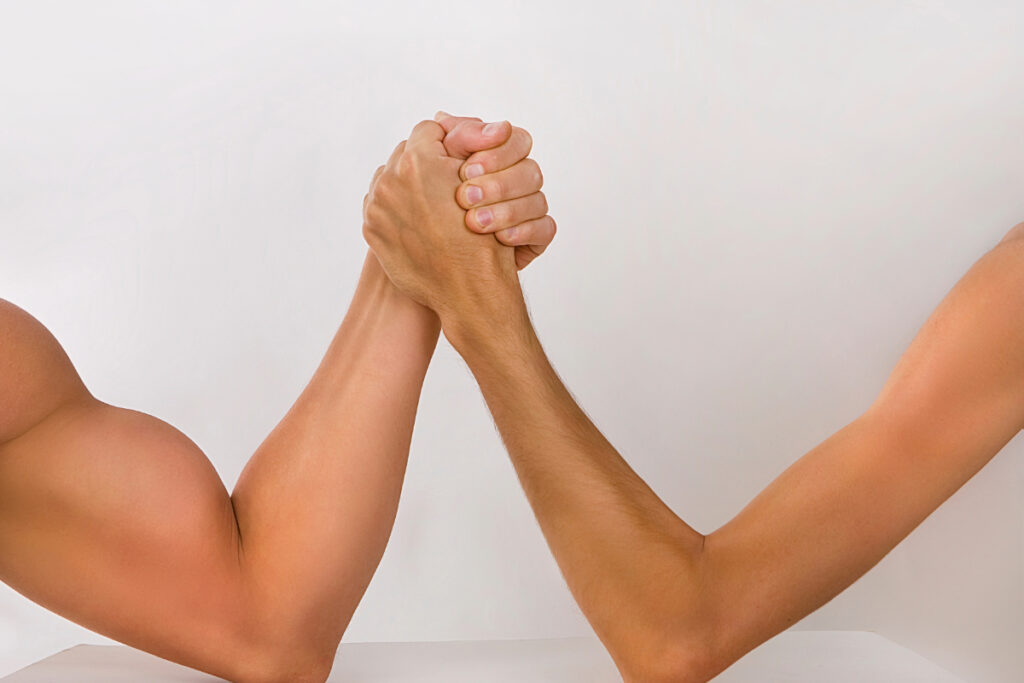 Two Hands Clasped Together Arm Wrestling